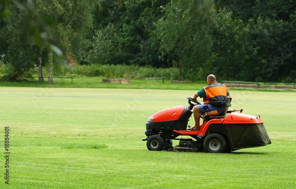 Obraz A man is driving the cutting machine