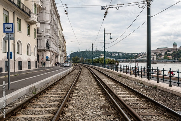 Fototapeta Railway tracks in riverbank of Danube river in Budapest.