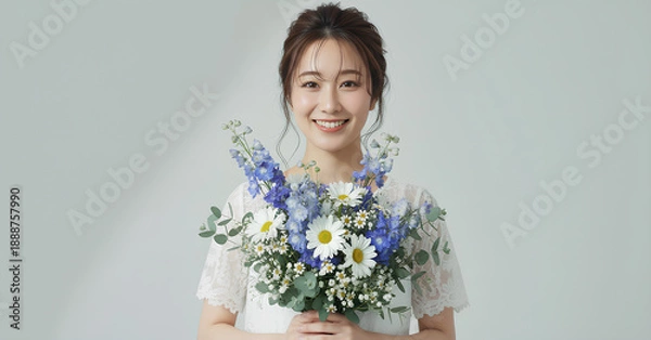 Obraz 白いレースドレスを着て花束を持つ美しい女性のポートレート	