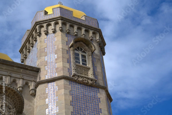 Obraz Tower lined with colorful tiles