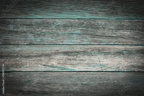 Fototapeta A rustic wooden background made of weathered boards with turquoise details