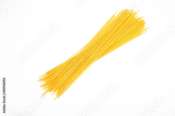Obraz Uncooked pasta spaghetti macaroni isolated on white background