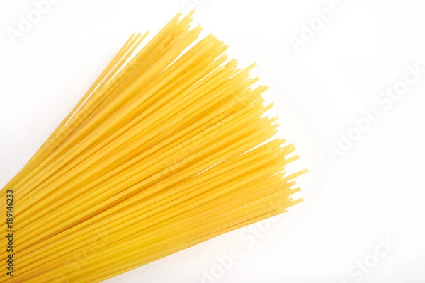 Obraz Uncooked pasta spaghetti macaroni isolated on white background