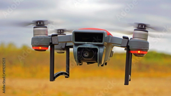 Fototapeta Flying Camera - Privacy Issues - Unmanned Aircraft System - Drone System