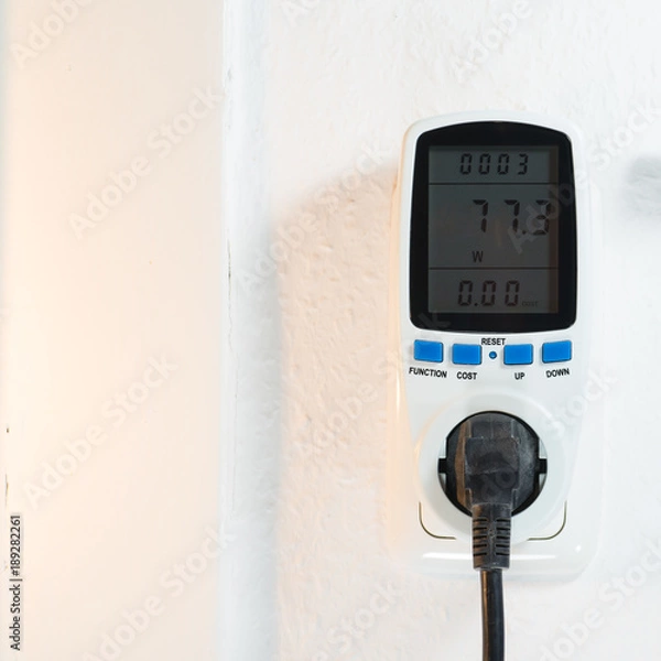 Fototapeta Consumption meter in a wall socket