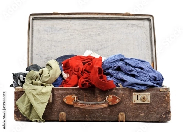 Obraz Old suitcase full of clothes isolated on white background