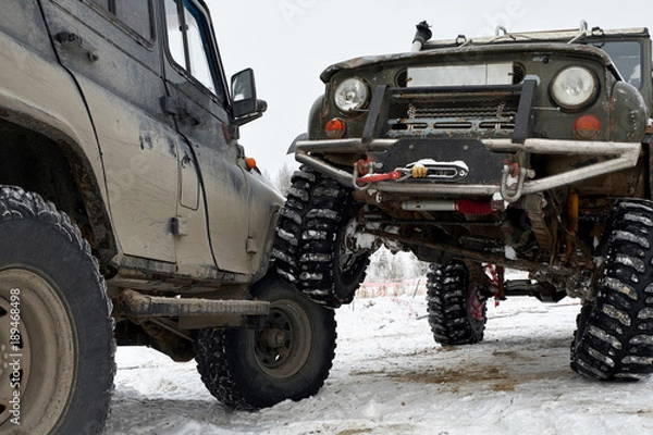 Fototapeta Russian Off-road car on winter landscape