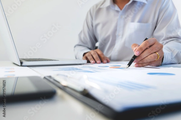 Fototapeta Business man analysis data document