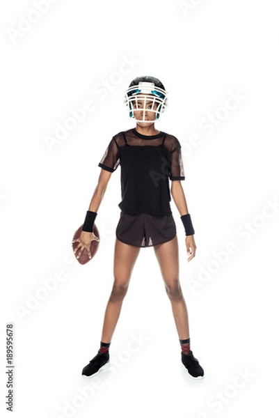 Fototapeta attractive female american football player with ball isolated on white