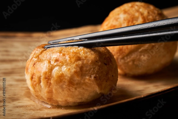 Obraz 出汁がじゅわっと溢れるたこ焼き