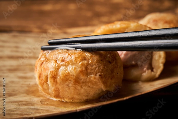 Obraz 出汁がじゅわっと溢れるたこ焼き