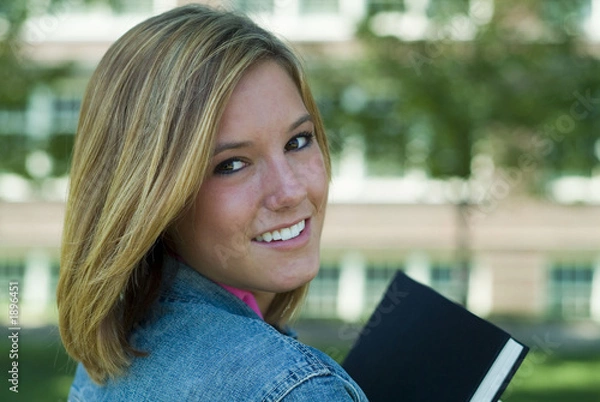 Obraz female student holding book