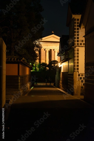 Obraz 夜の街道と建物