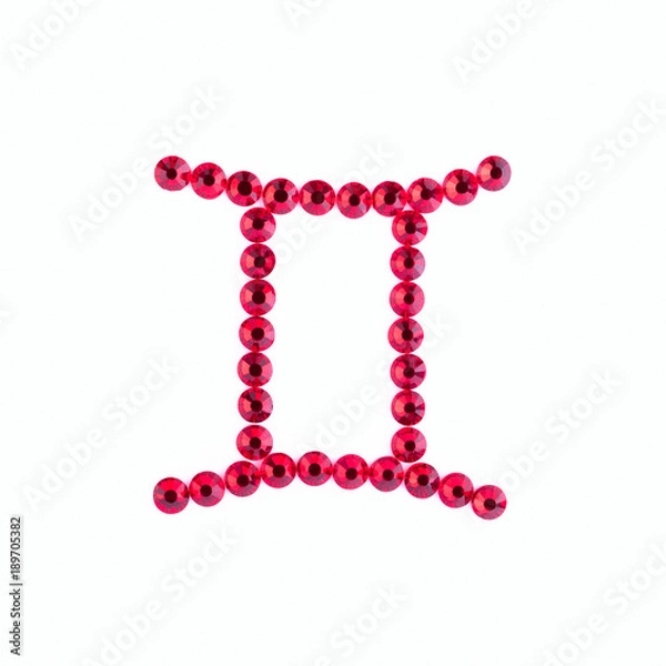 Obraz Gemini. Sign of the zodiac of red rhinestones on a white background.