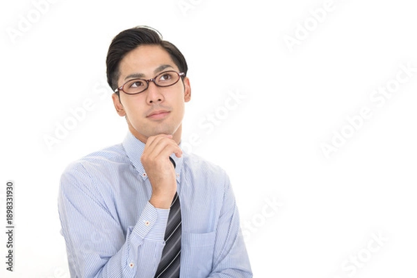 Obraz 考え事をするビジネスマン