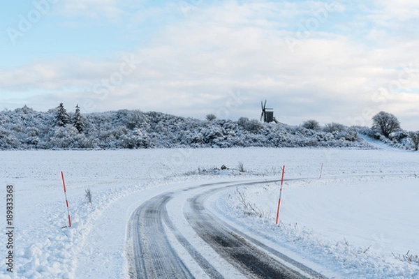 Obraz Old windmill view from a country road