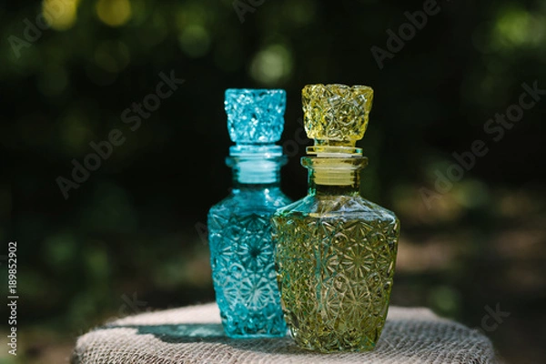 Fototapeta Two colored crystal decanter