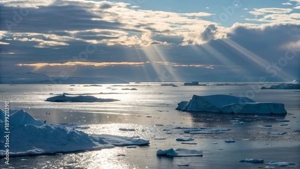 Fototapeta Sun rays coming from clouds on ocean. 