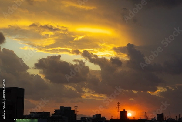 Obraz 黄色とオレンジ色の夕焼け