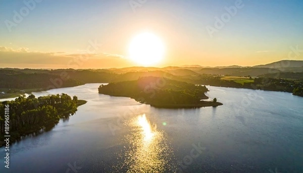 Obraz Serene River Landscape at Sunset.