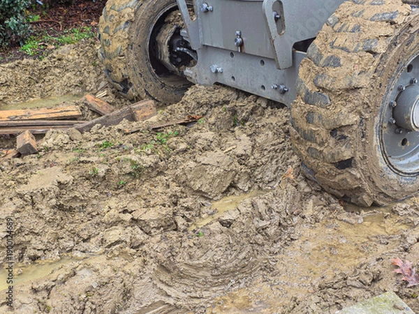 Obraz Equipment operates on muddy ground