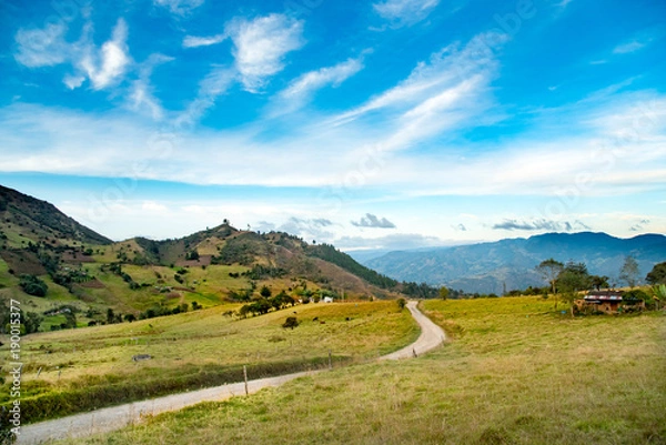 Obraz landscape with dirt road between mountains. Colombia.