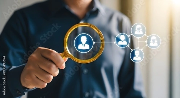 Obraz A man interacting with a digital interface of connected user profiles