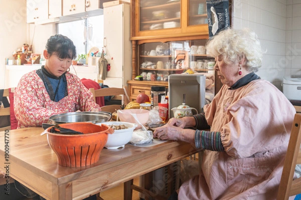 Obraz 料理準備する孫娘