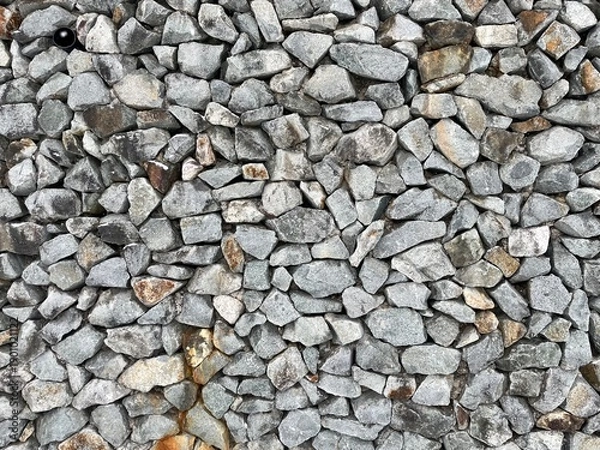Obraz 自然石が敷き詰められた石垣の写真