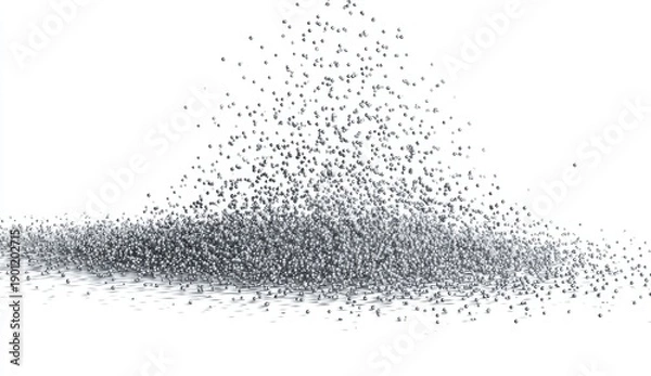 Obraz Tiny particles cascade down onto a surface, creating a pile with a bright background