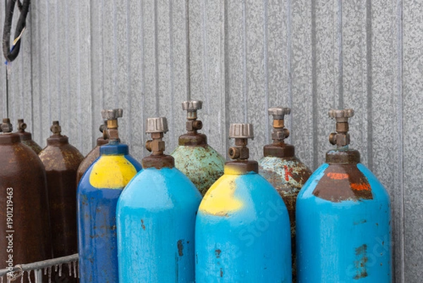 Fototapeta old gas bottles