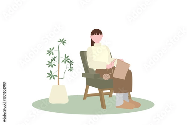 Obraz ソファで編み物をする女性