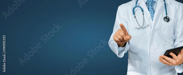 Fototapeta Doctor With Tablet Pointing On Blue Background. Modern Technology In Healthcare And Medicine Concept