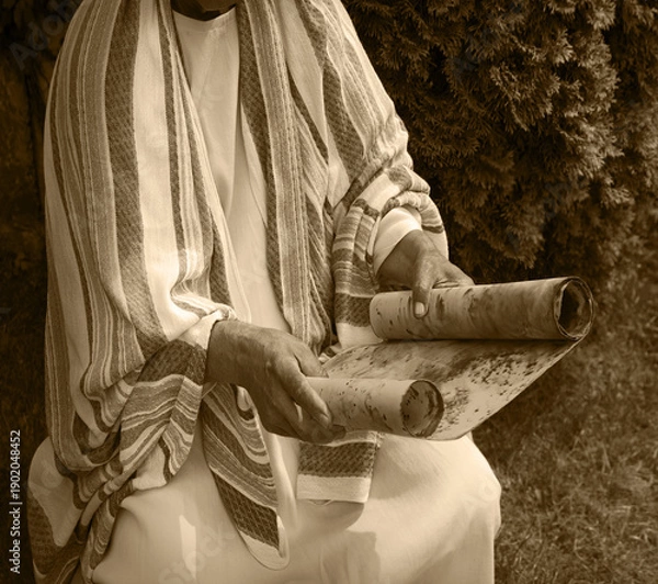 Obraz Old man reading the scroll