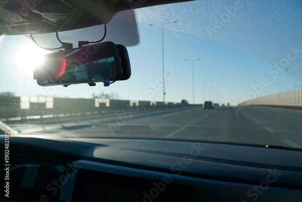 Obraz View from the car interior while driving