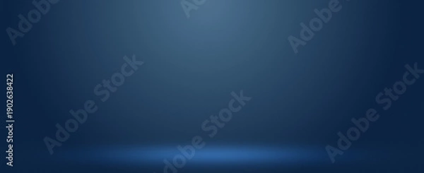 Obraz Moody dark blue studio background with soft spotlight