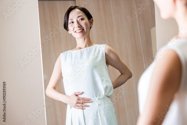 Obraz お腹を触る女性