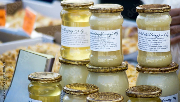 Obraz honey in jars at the marketplace