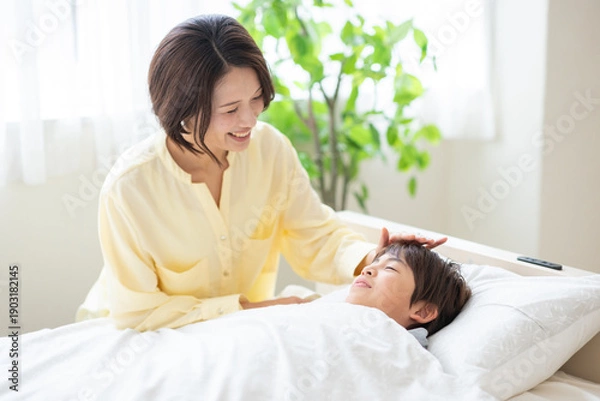 Obraz 息子の看病をする母親