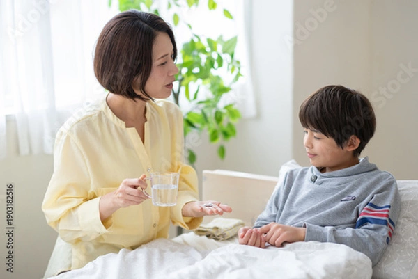 Obraz 息子の看病をする母親