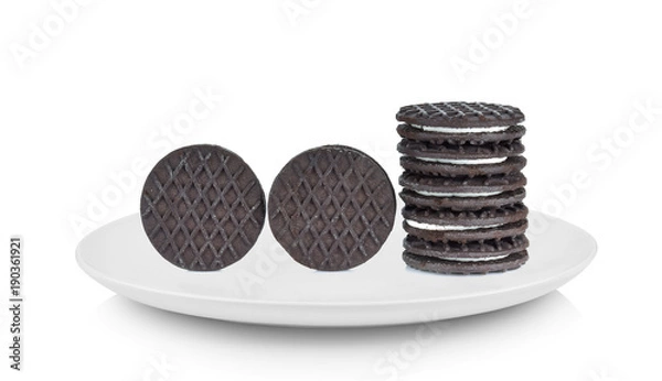 Obraz sandwich cookies with cream in white plate on white background