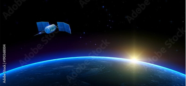 Obraz Sputnik flying in outer space above the Earth and Sun on the background.
