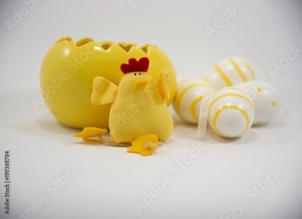 Fototapeta Yellow Easter egg and chicken with small decorative eggs 3rd