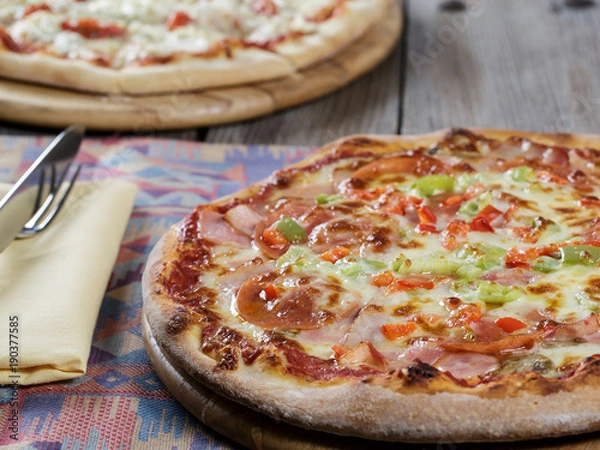 Obraz pizza on a board