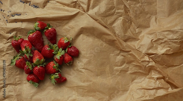 Obraz Strawberries on craft paper. 