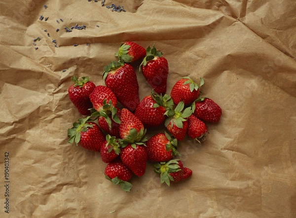 Obraz Strawberries on craft paper. 
