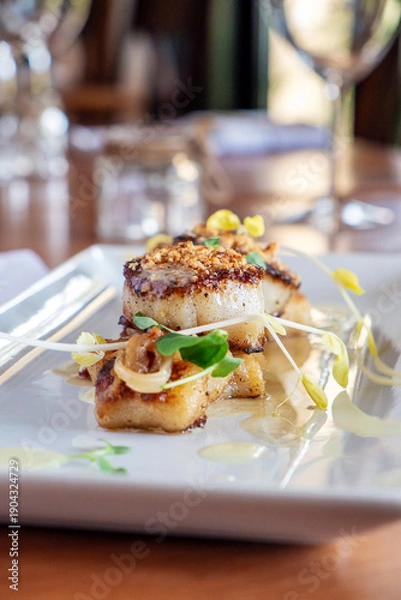 Obraz Upscale seared scallop dish on table setting