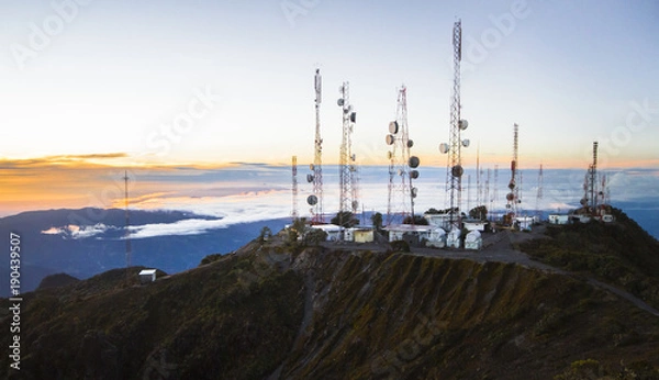 Fototapeta An array of communications towers sits on top of Volcan Barú, Panama's highest point, as seen at sunrise.