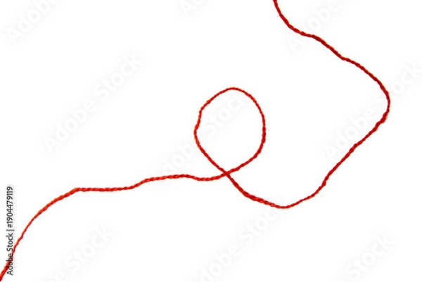 Fototapeta Red thread isolate on white background. Selective focus. Old.