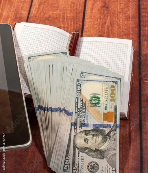 Obraz Manager's accessories: money, notebook, tablet, and pen